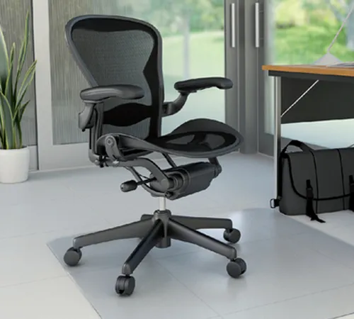 Bureastoelmat onder bureau